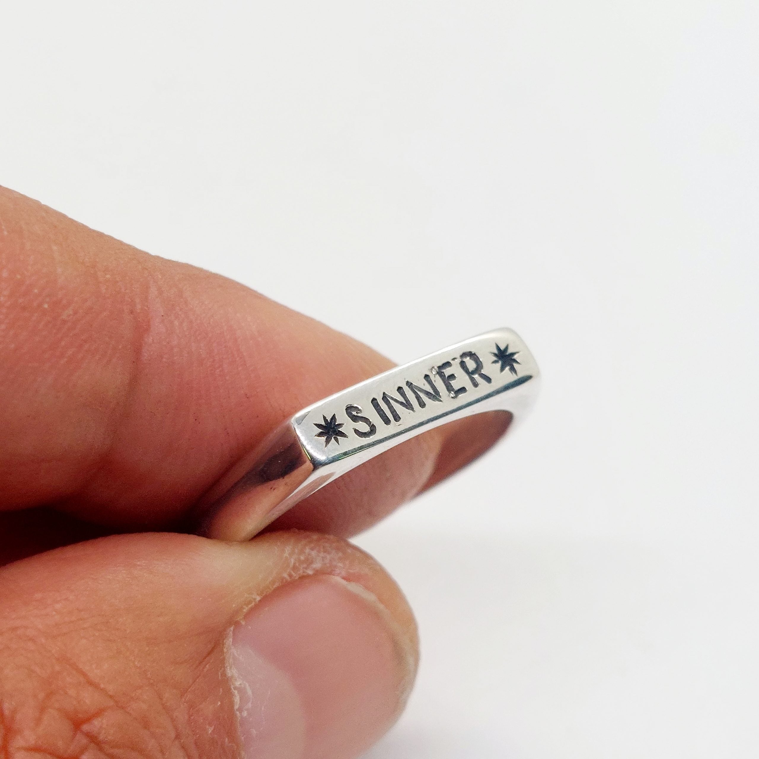 Ring *Sinner*