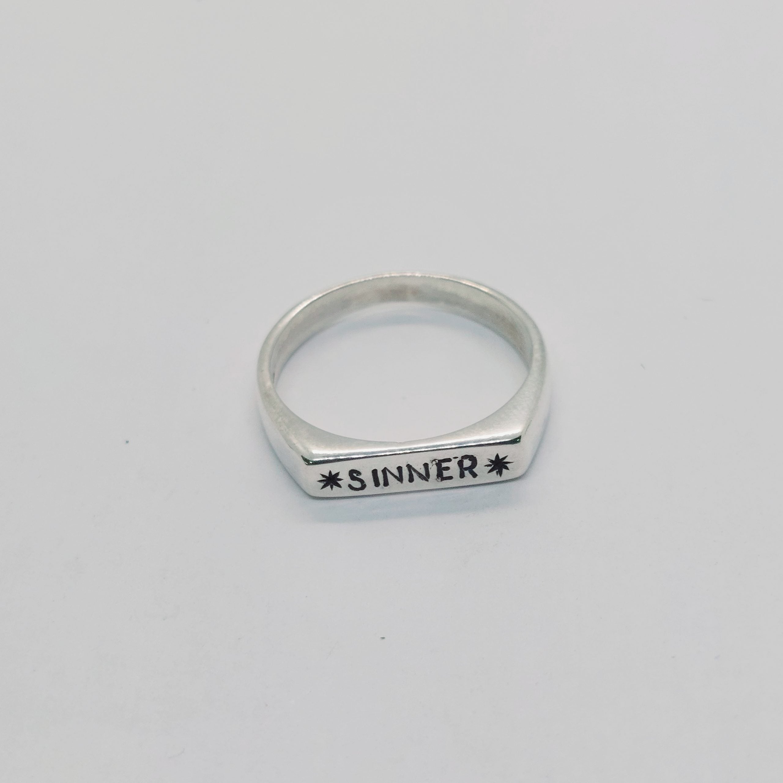 Ring *Sinner*