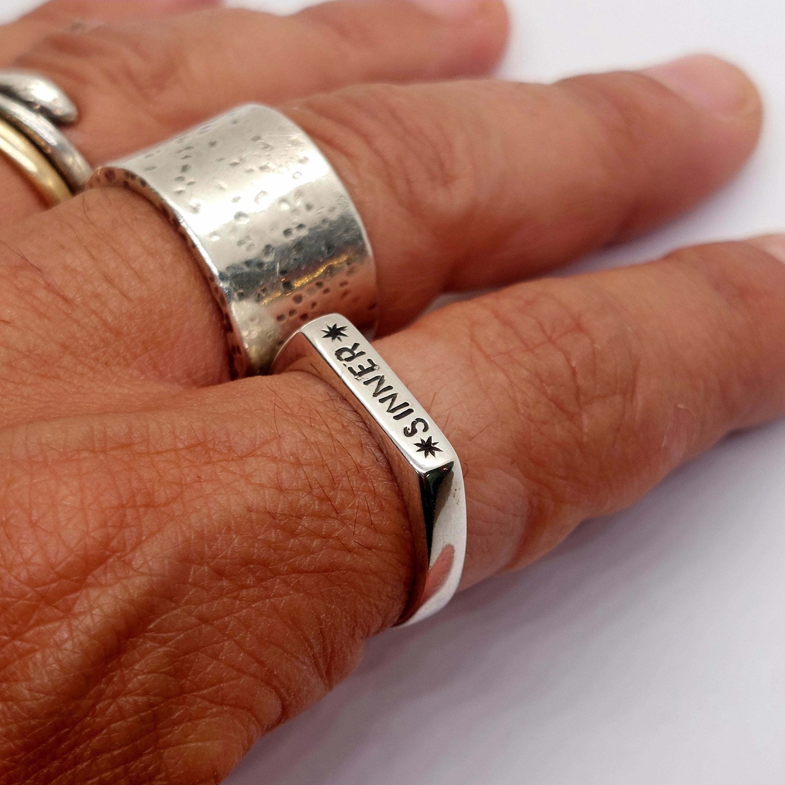 Ring *Sinner*